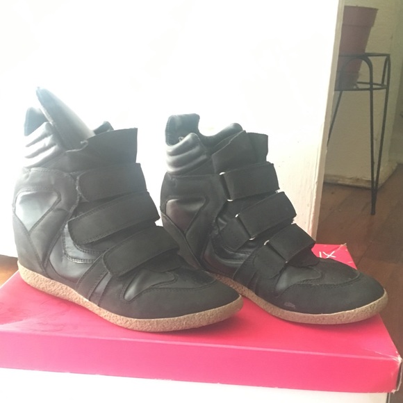 black wedge sneakers with black soles